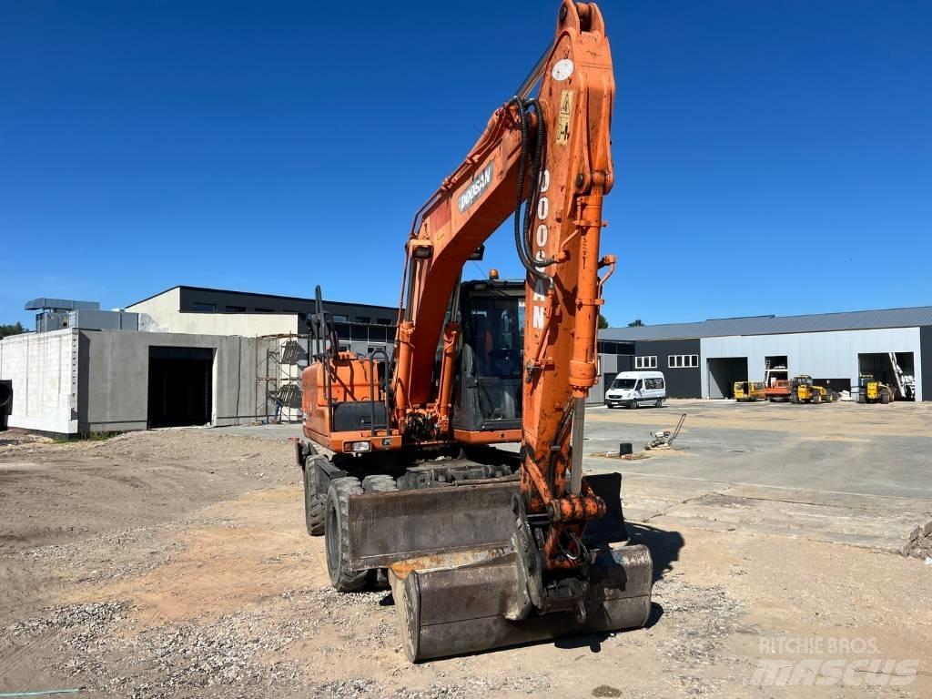 Doosan DX 140 W Колесни екскаватори