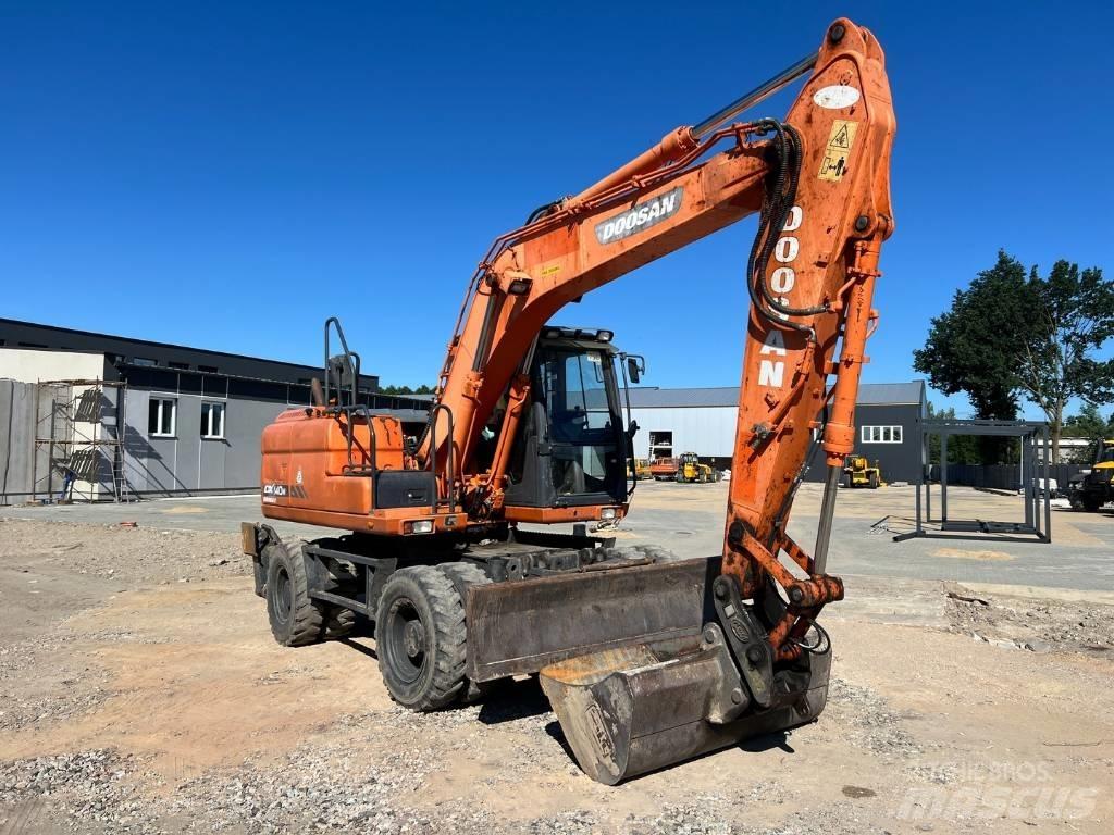 Doosan DX 140 W Колесни екскаватори