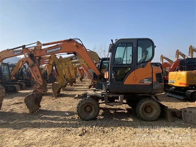 Doosan DX60W Мини екскаватори < 7 т