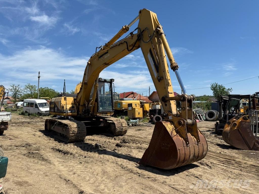 CAT 318 Релси, вериги и ходова част
