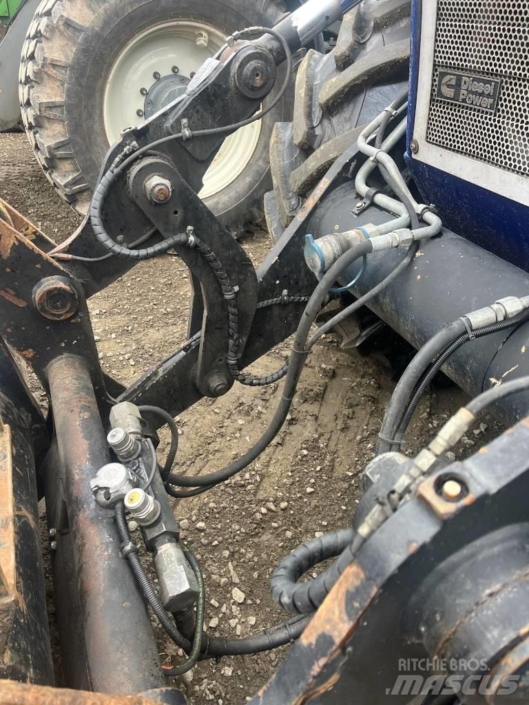 Huddig 1260 B Товарач със заден ексватор