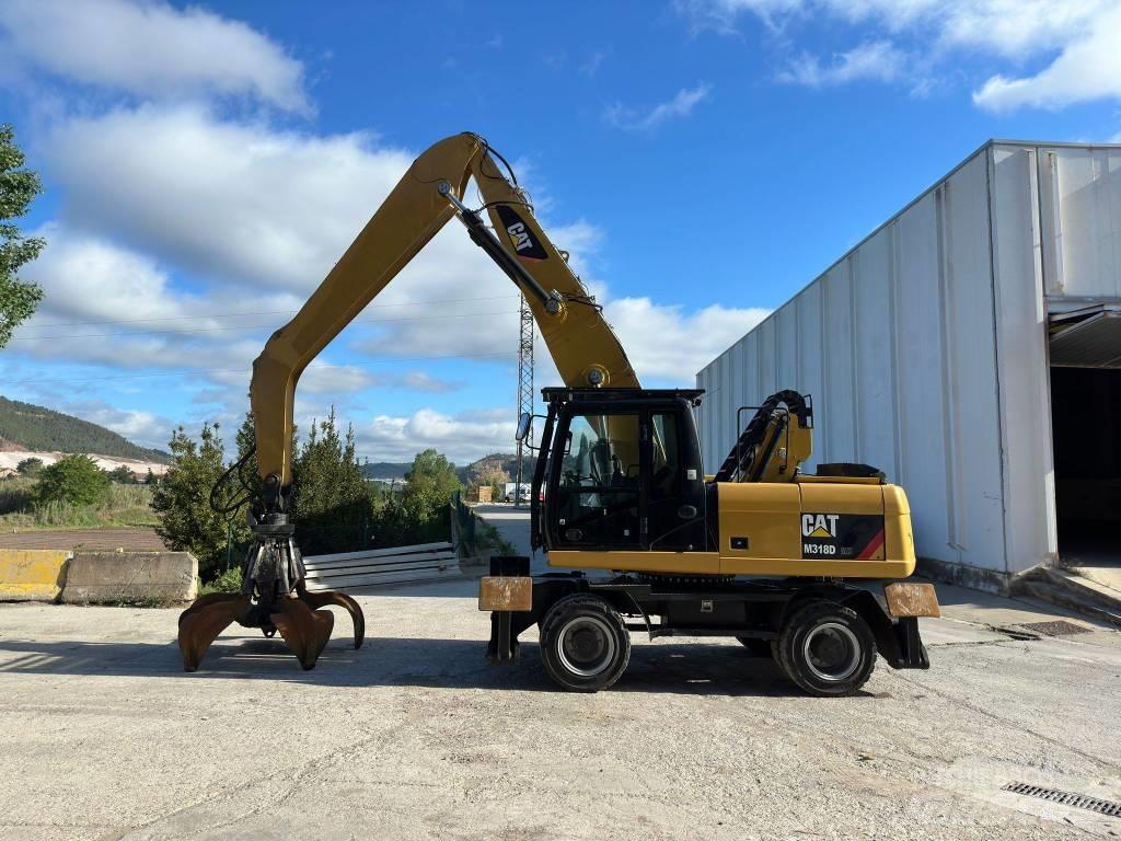 CAT M 318 MH Колесни екскаватори