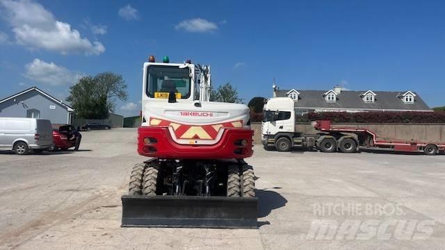 Takeuchi TB295W Колесни екскаватори
