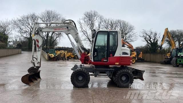 Takeuchi TB295W Колесни екскаватори