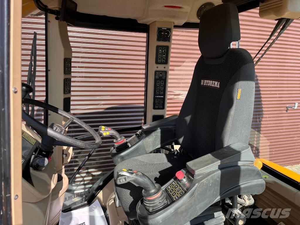 Hydrema 906F Товарач със заден ексватор
