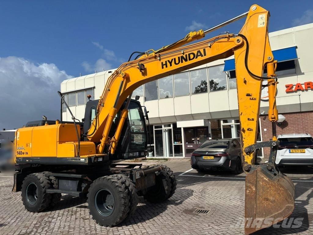 Hyundai 140W-7A Колесни екскаватори