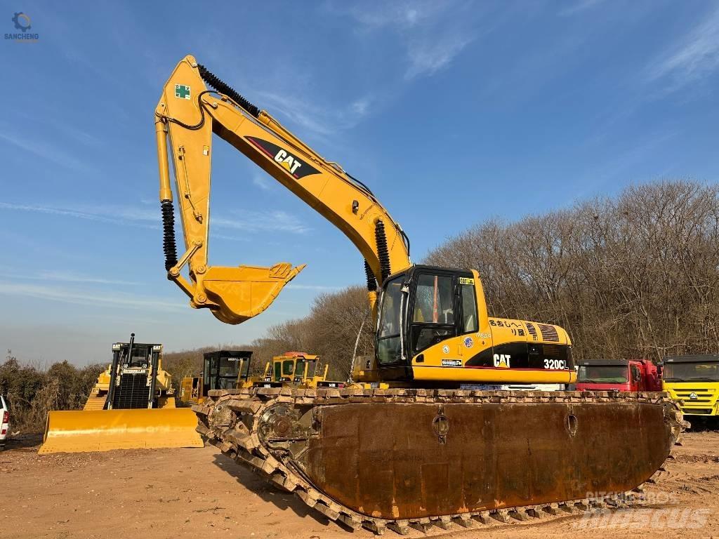 CAT 320 C L Багери амфибии