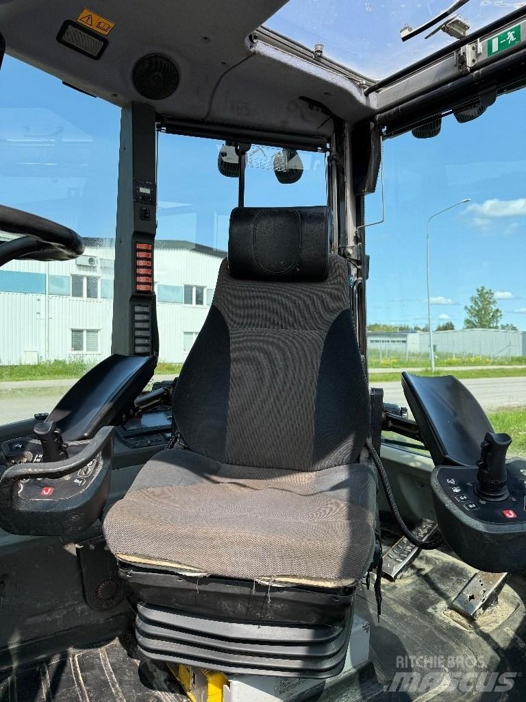 Huddig 1260 C Товарач със заден ексватор
