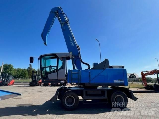 Fuchs MHL 334F Оператори на отпадъци/индустрия

