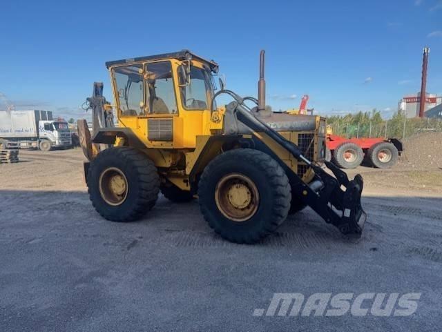 Volvo BM 6300 Товарач със заден ексватор