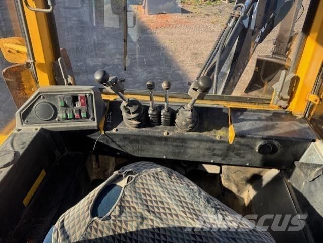 Volvo BM 6300 Товарач със заден ексватор