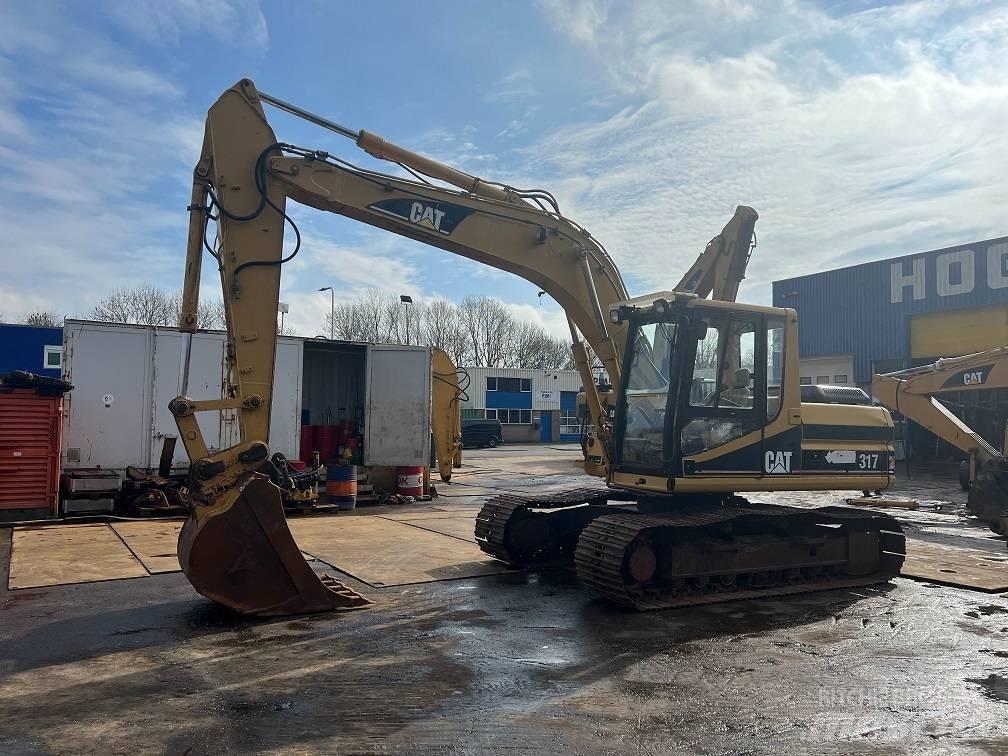 CAT 317 Верижен екскаватор
