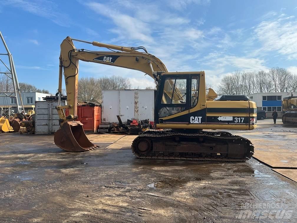 CAT 317 Верижен екскаватор