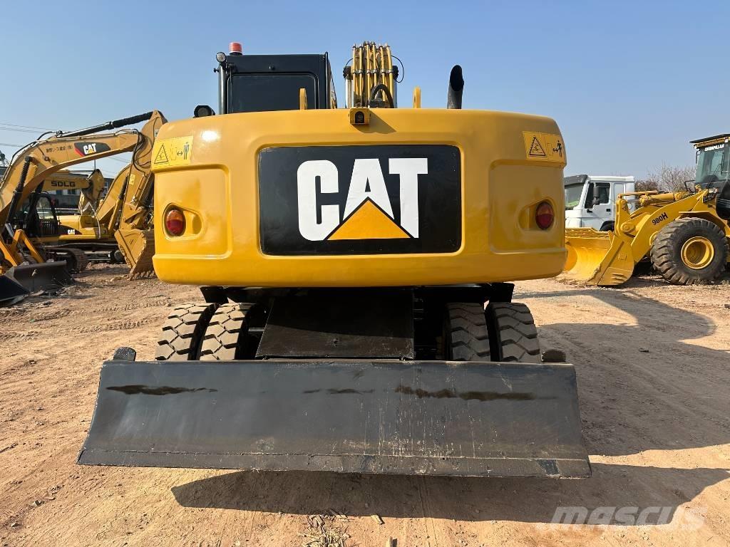 CAT M 320D Колесни екскаватори