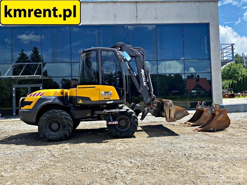Mecalac 12 M TX Товарач със заден ексватор