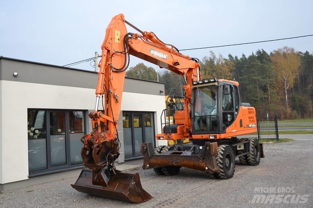 Doosan DX 140 W Колесни екскаватори