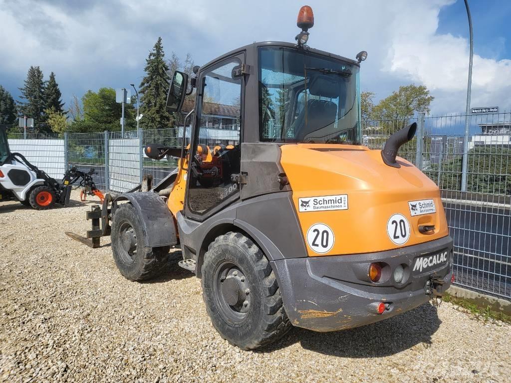 Mecalac AX 700 Колесни товарачи