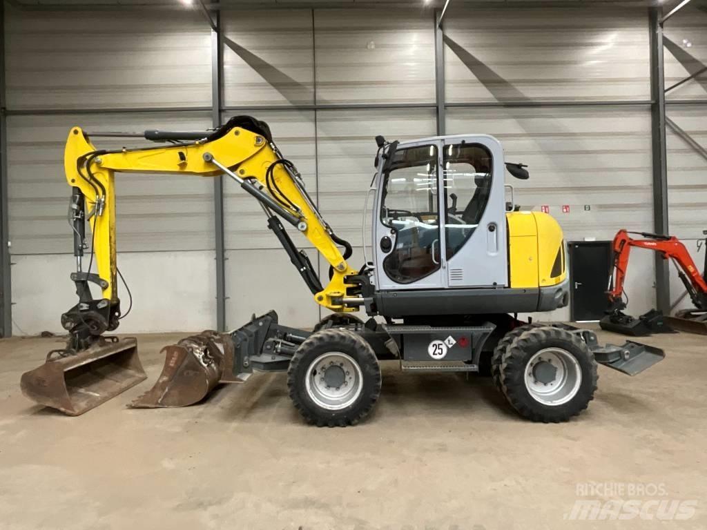 Neuson EW 100 Колесни екскаватори