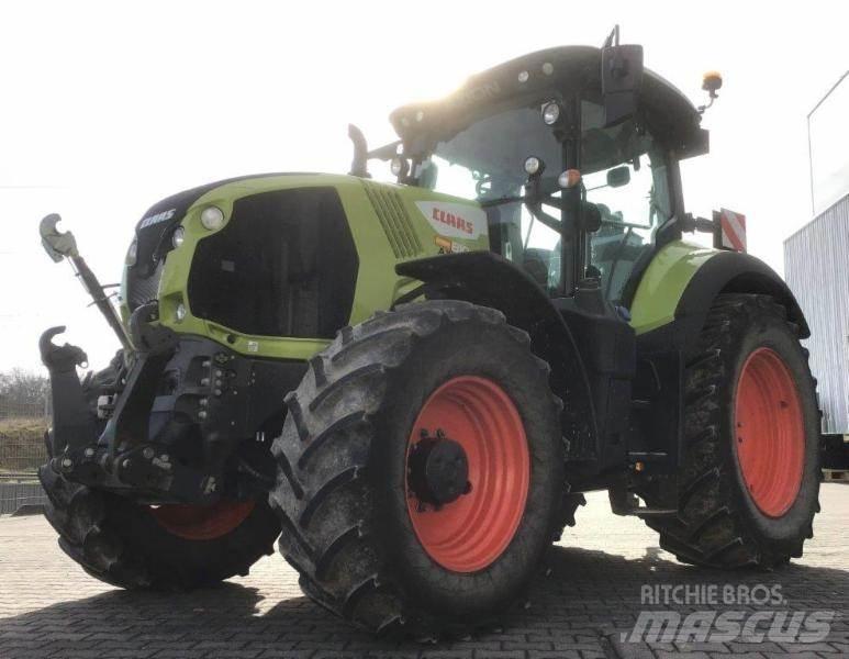 CLAAS AXION 810 Трактори
