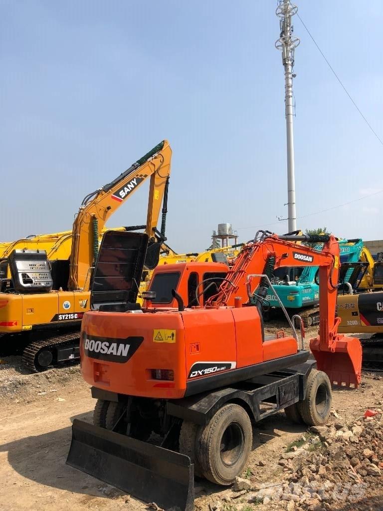 Doosan DX150W Колесни екскаватори