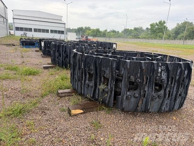 CAT 6020 new parts Релси, вериги и ходова част
