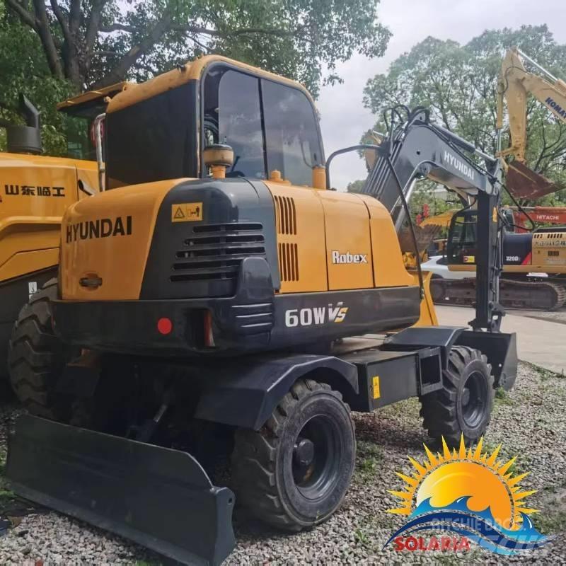 Hyundai R 60 W Колесни екскаватори