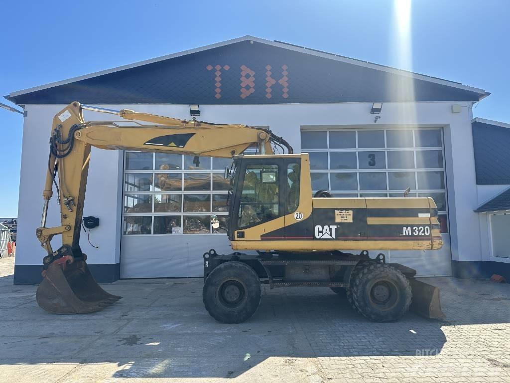 CAT M 320 VAH Колесни екскаватори