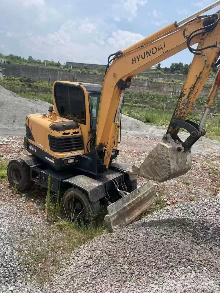 Hyundai 60W-9 Колесни екскаватори