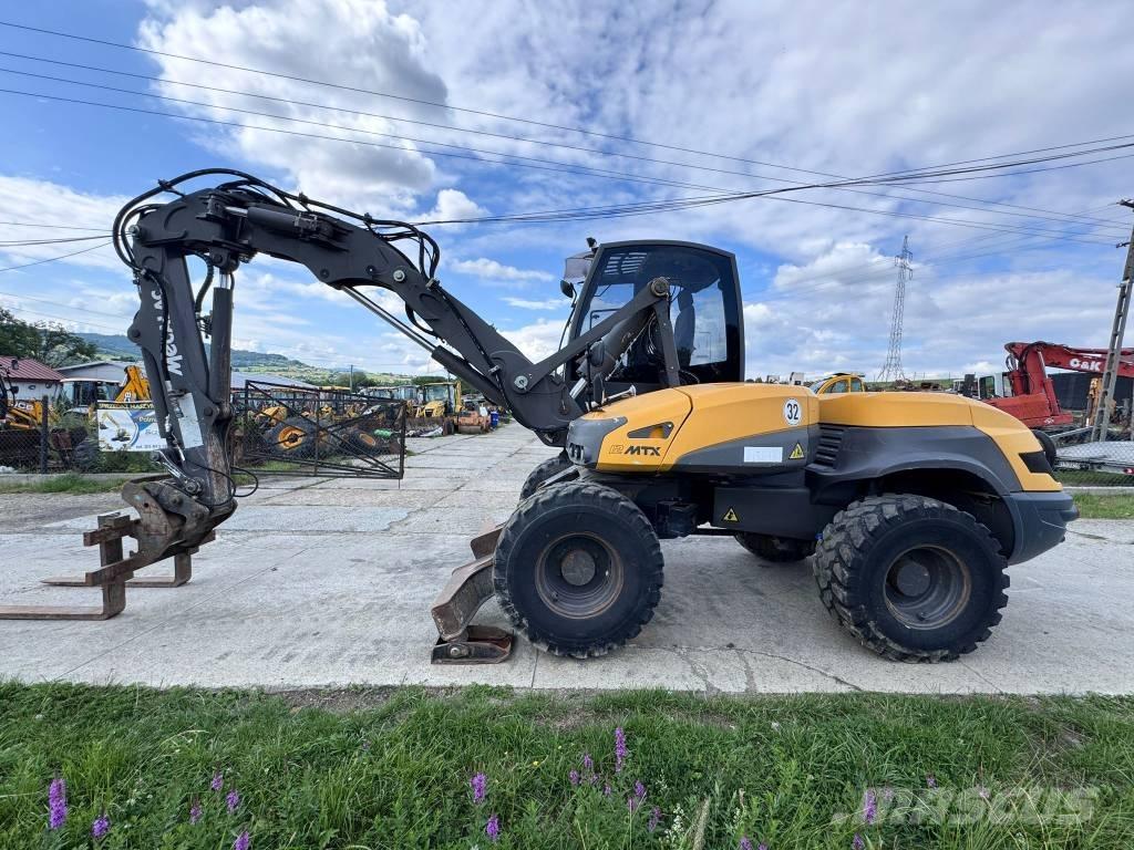 Mecalac 12 MTX Товарач със заден ексватор