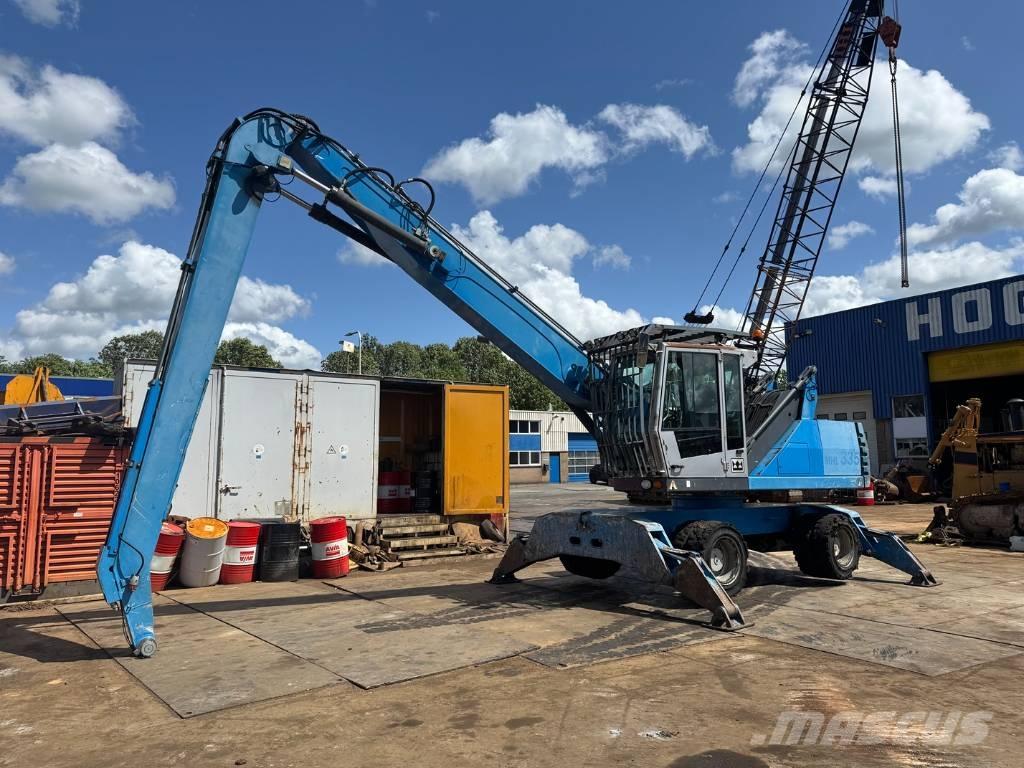 Fuchs MHL 335 Оператори на отпадъци/индустрия
