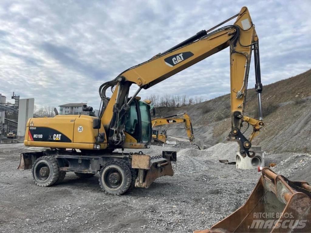 CAT M318D Колесни екскаватори