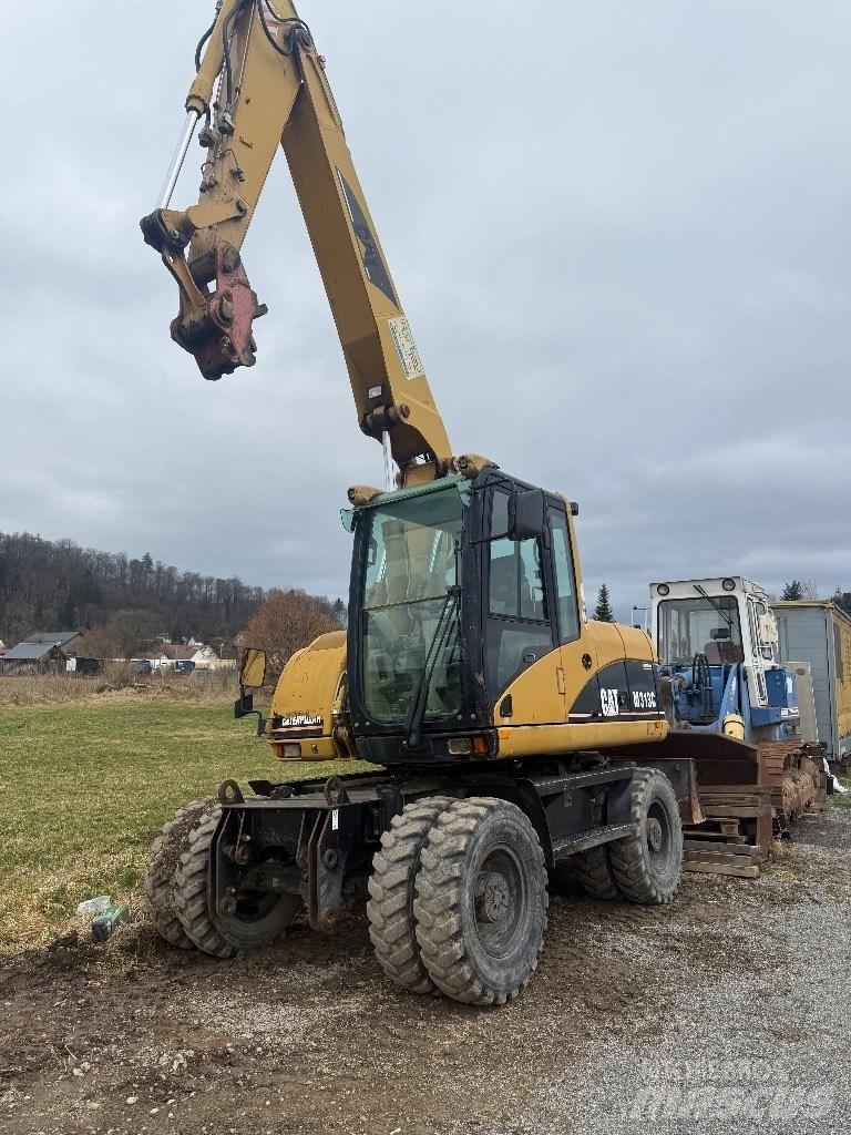 CAT M 313 C Колесни екскаватори