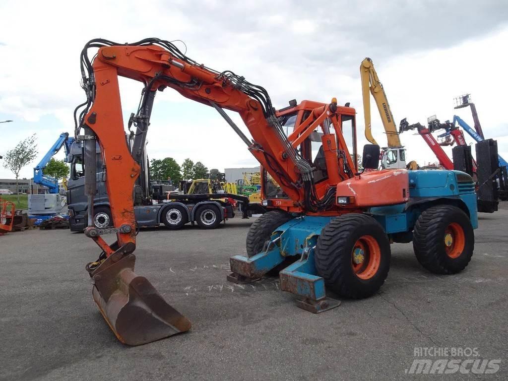 Mecalac 12MXT Колесни екскаватори