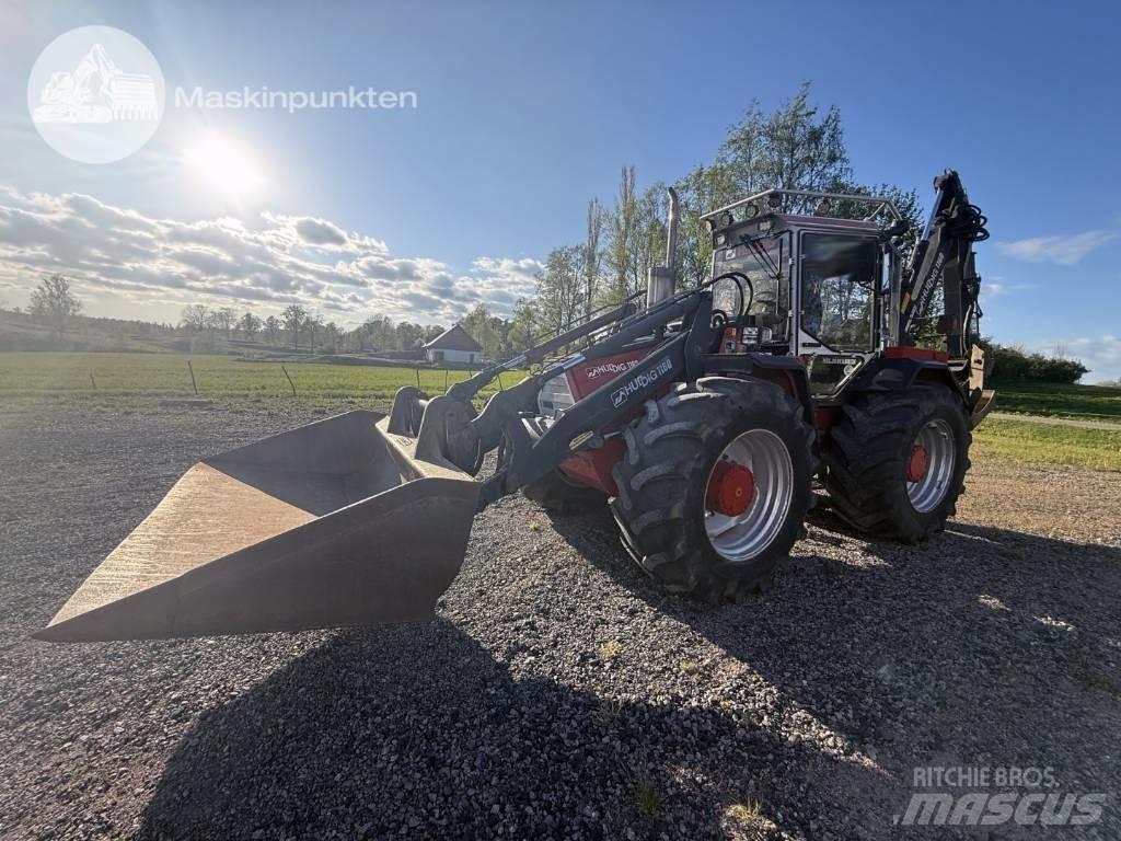 Huddig 1160 Товарач със заден ексватор
