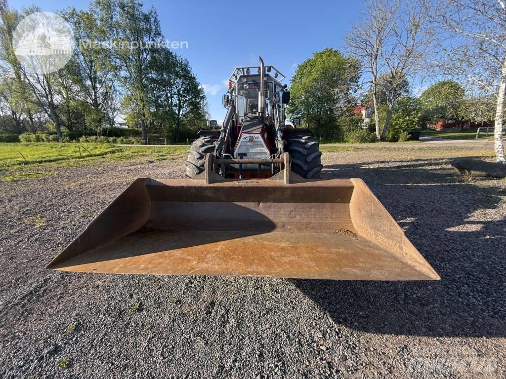 Huddig 1160 Товарач със заден ексватор
