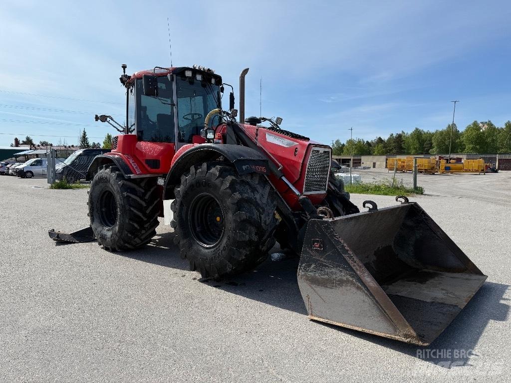 Huddig 1260 Товарач със заден ексватор