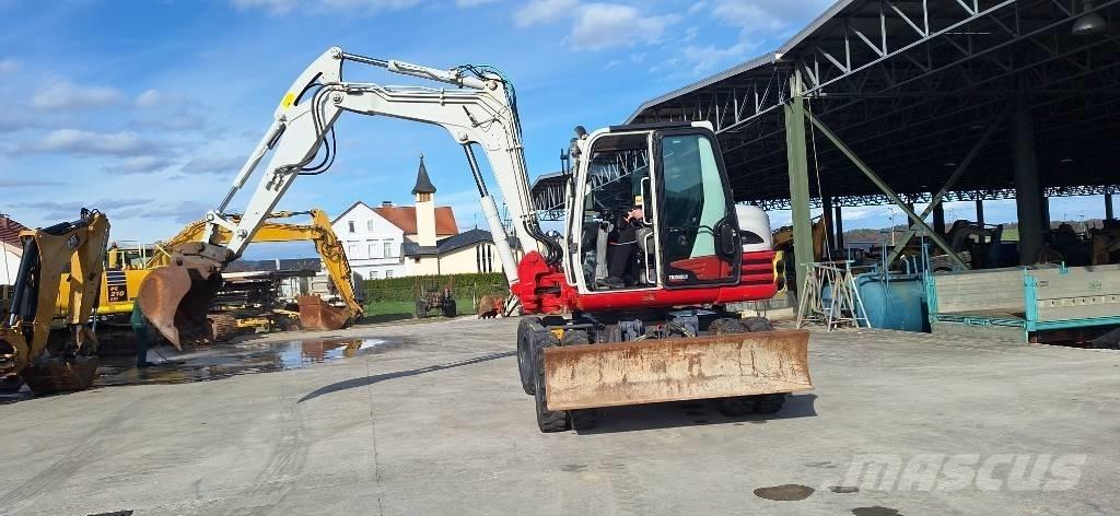 Takeuchi TB 295 W Колесни екскаватори