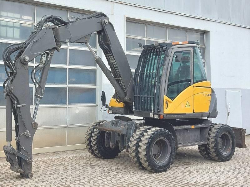 Mecalac 714 MW Колесни екскаватори
