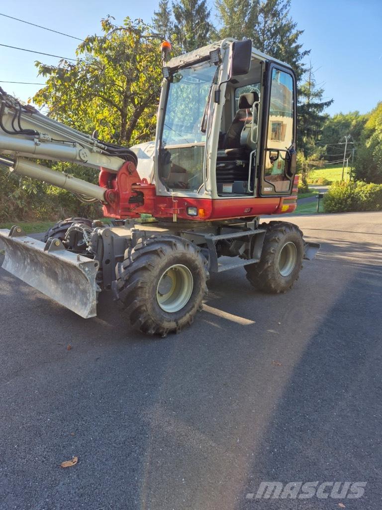 Takeuchi TB 295 W Колесни екскаватори