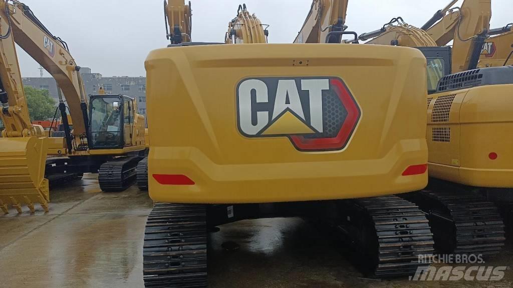 CAT 2022 CAT 323GC Колесни екскаватори