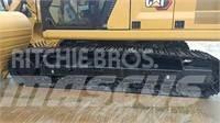 CAT 2022 CAT 323GC Колесни екскаватори