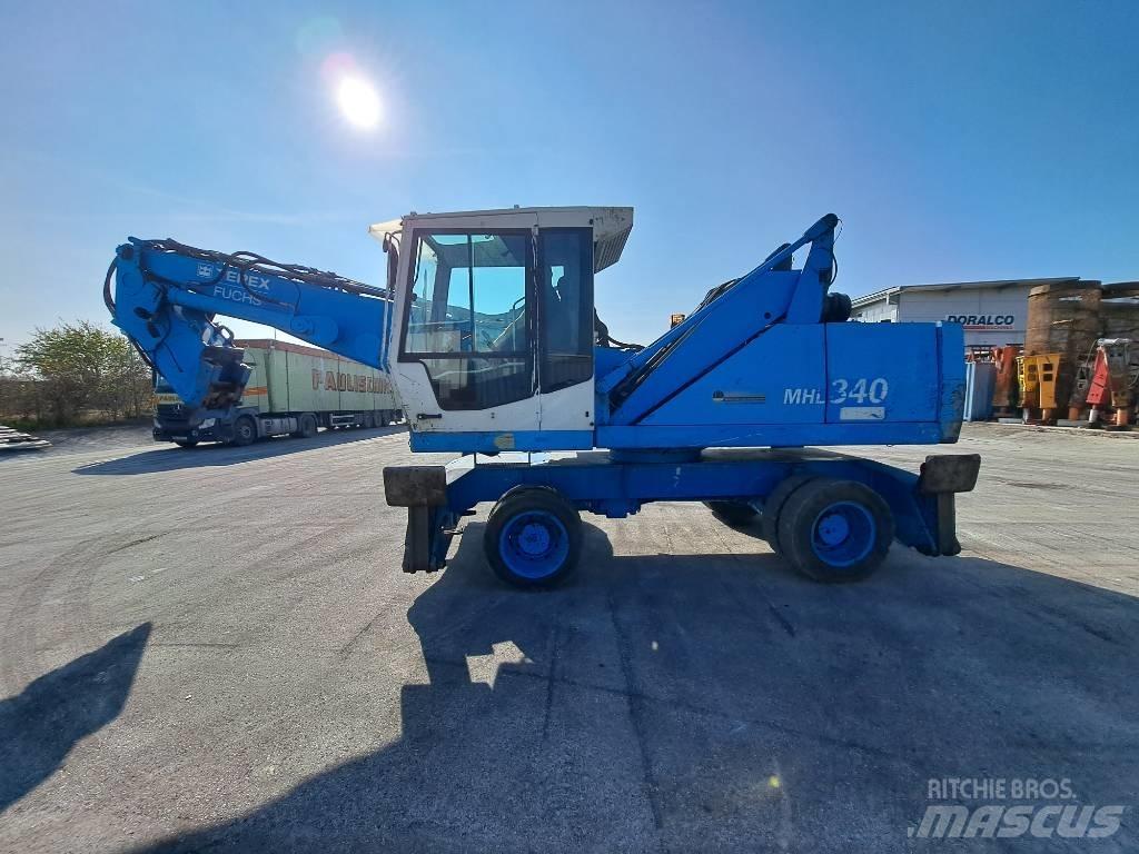 Fuchs MHL  340C FQC Оператори на отпадъци/индустрия
