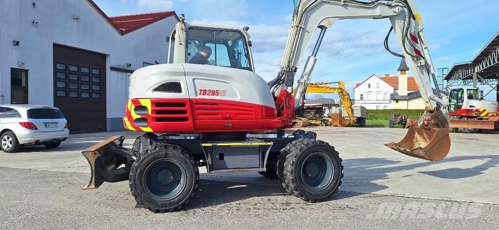 Takeuchi TB 295W Колесни екскаватори