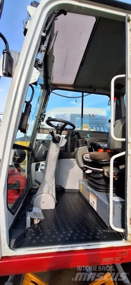 Takeuchi TB 295W Колесни екскаватори