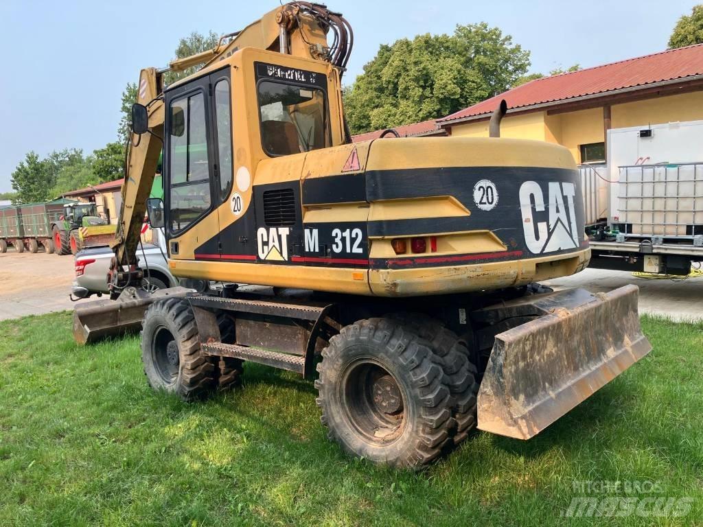 CAT M 312 Колесни екскаватори