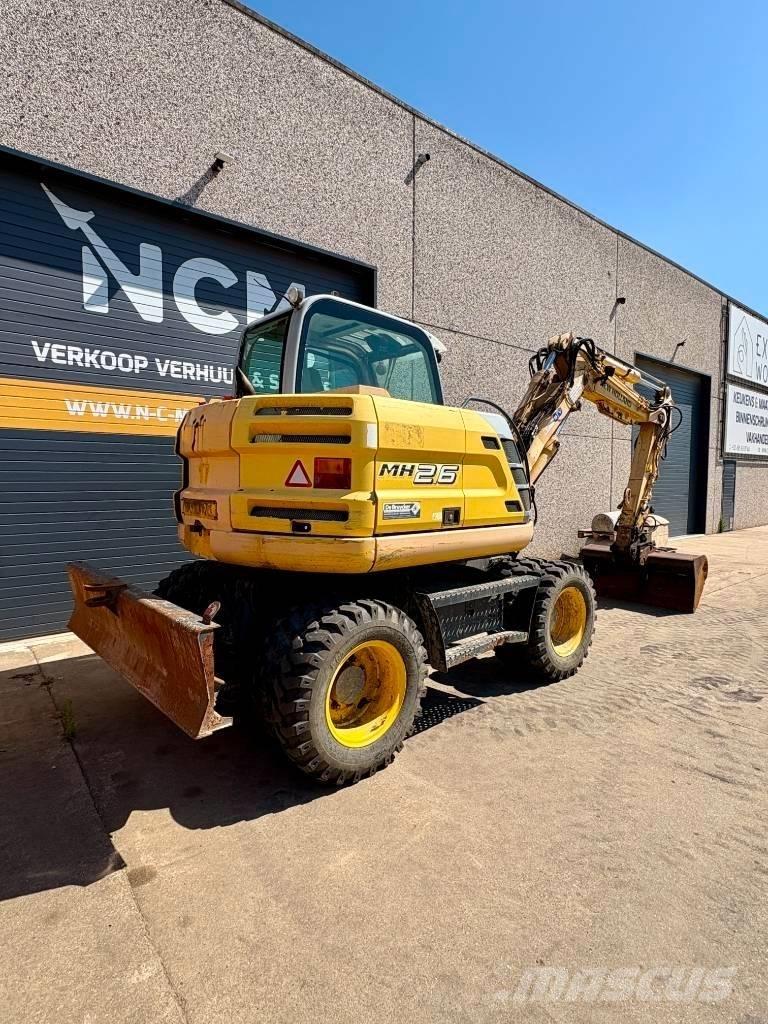 New Holland MH 2.6 Колесни екскаватори