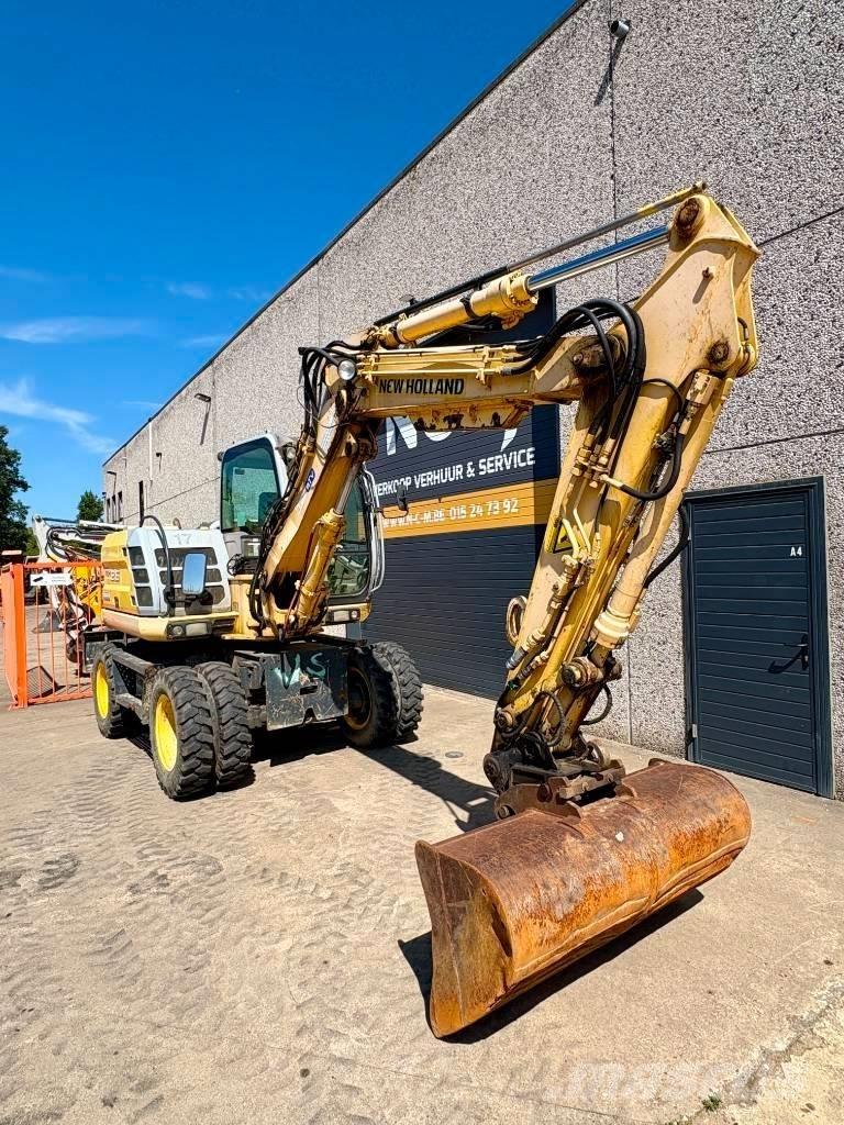 New Holland MH 2.6 Колесни екскаватори