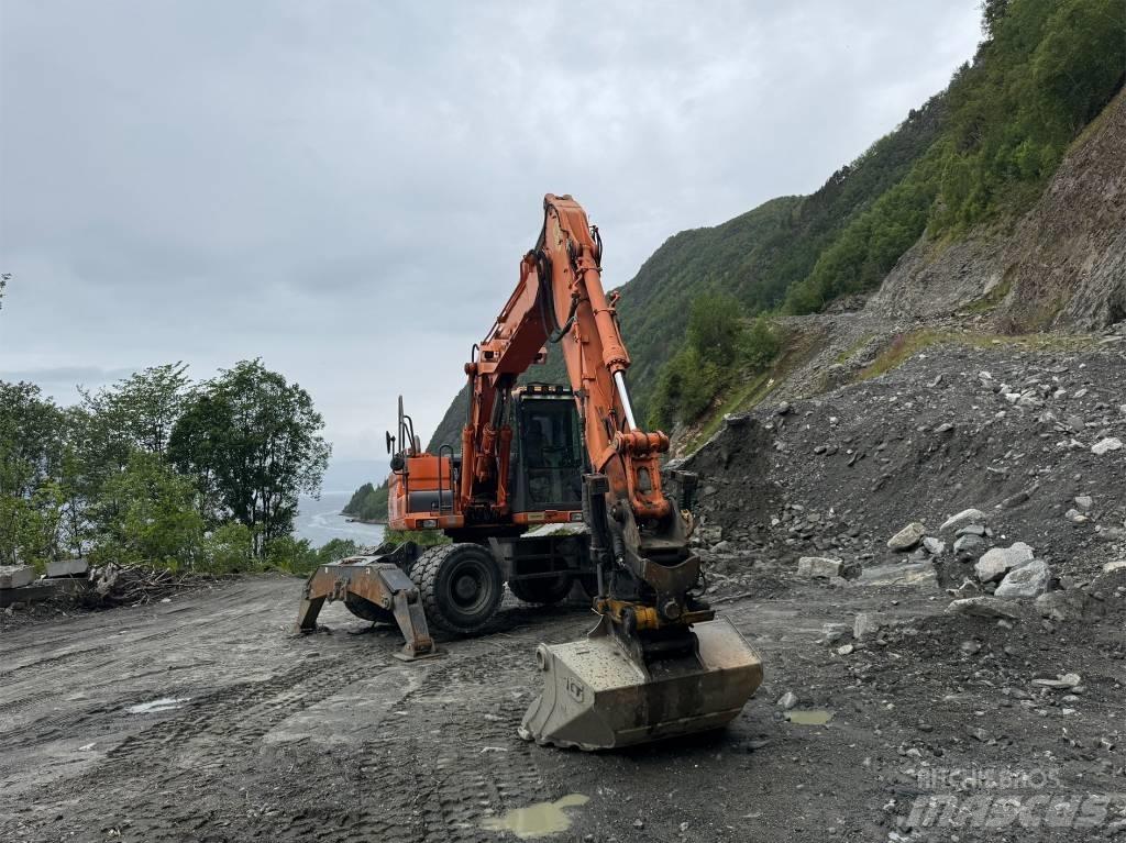 Doosan 140 W Колесни екскаватори