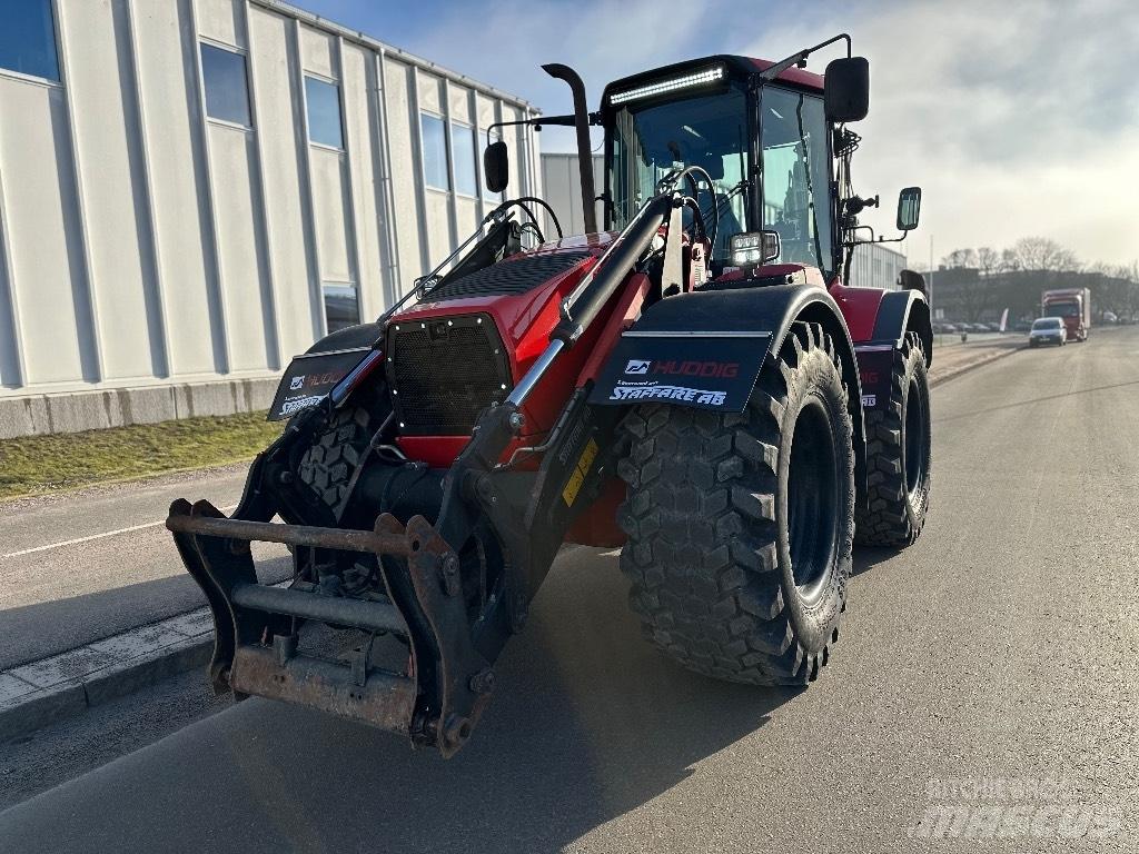 Huddig 1260 C Товарач със заден ексватор