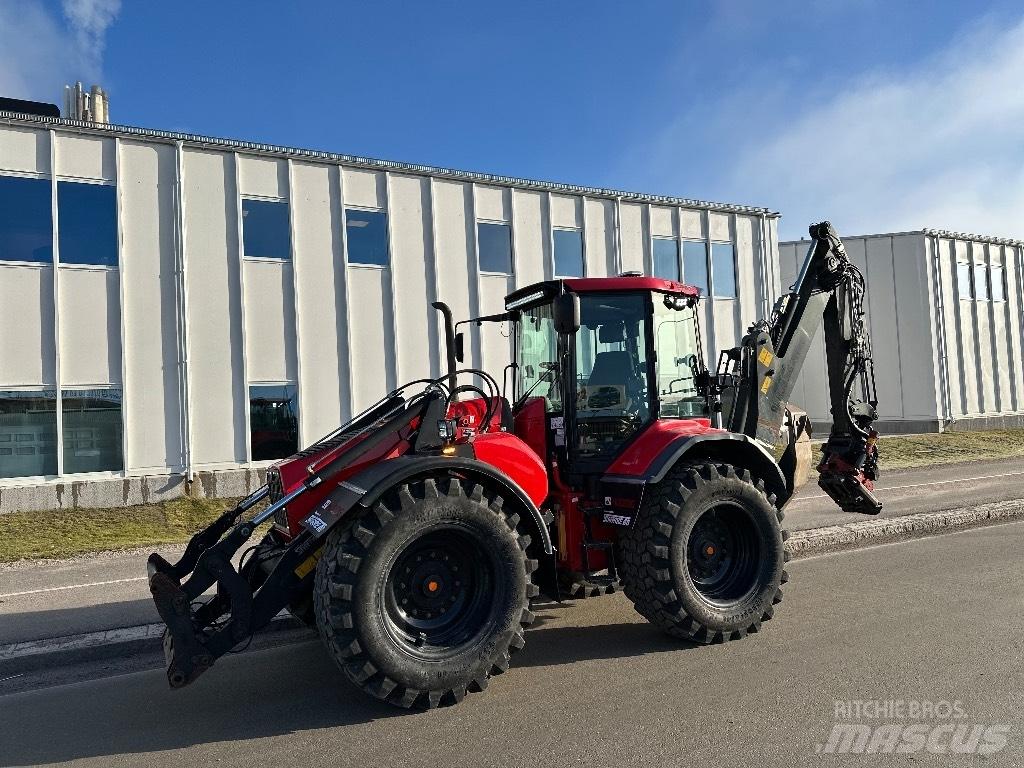 Huddig 1260 C Товарач със заден ексватор